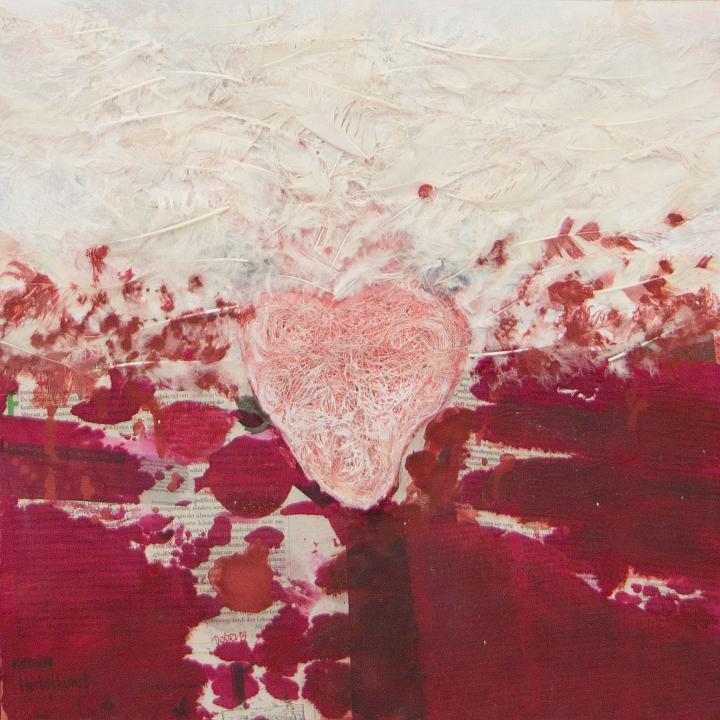 corazon con plumas